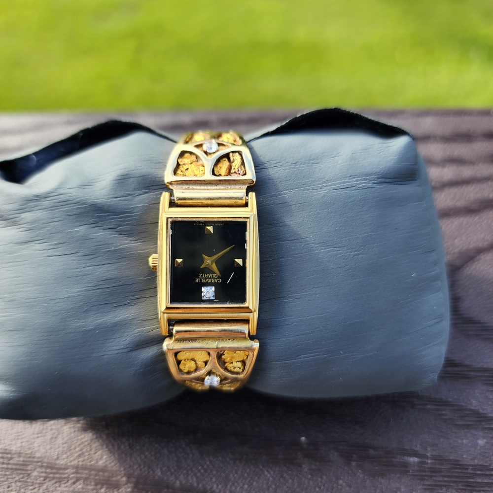 Elegant Gold and Black Women's Watch